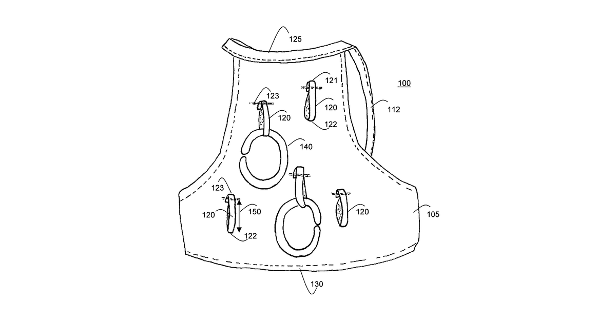 Patent drawing for Bib for holding detachable infant toys